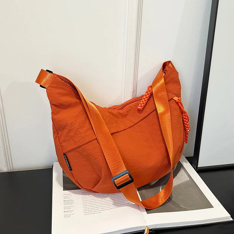Casual Nylon Dumpling aped Crossbody Bag Women's Large Capaci oulder Bag 2026 Autumn Season Zipper Closure Faionable Handbags