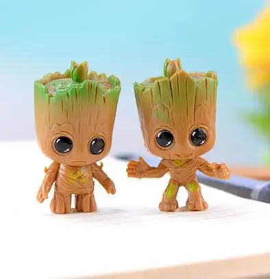 4pcs/set Marvel Guardians of The Galaxy Avengers Tiny Groots Cute Baby Tree Man