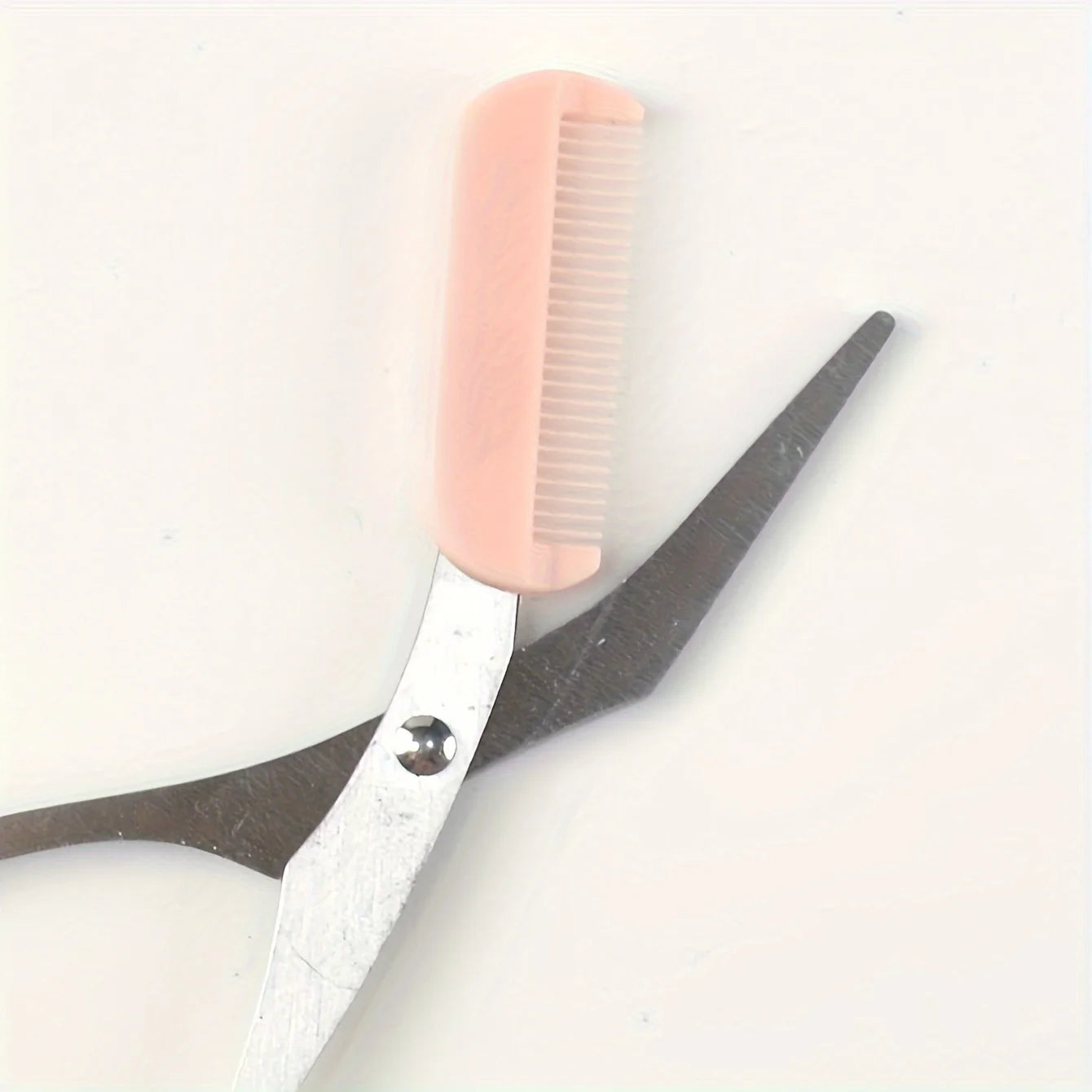 Pink eyebrow trimming scissors w/ built-in comb, precise grooming tool