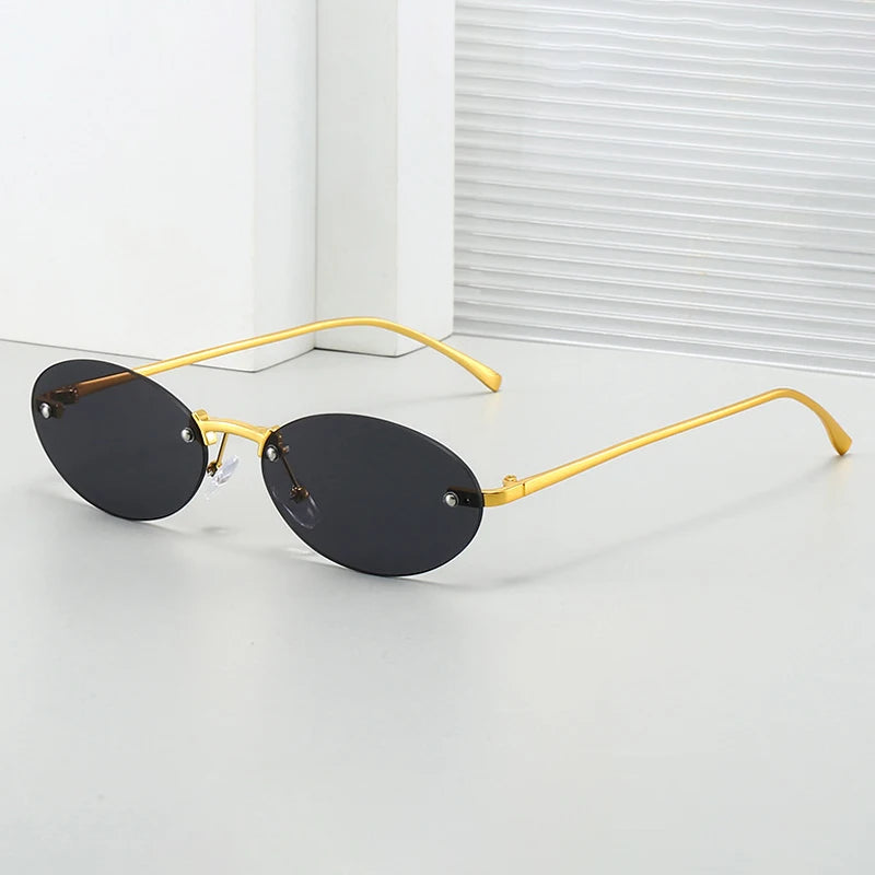 JNPCXI New Retro Rimless Metal Oval Sunglasses Women Fashion Gold Black Candy Color Shades UV400 Men Punk Sun Glasses