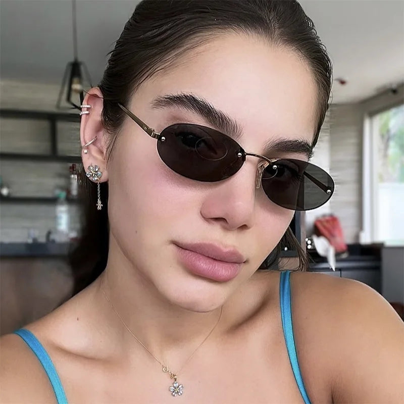 JNPCXI New Retro Rimless Metal Oval Sunglasses Women Fashion Gold Black Candy Color Shades UV400 Men Punk Sun Glasses