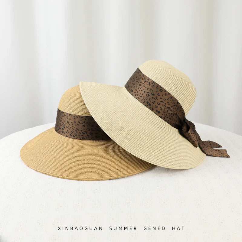 6177-New summer women's high-end leopard print bow hat for beach and resort, with sun protection function.