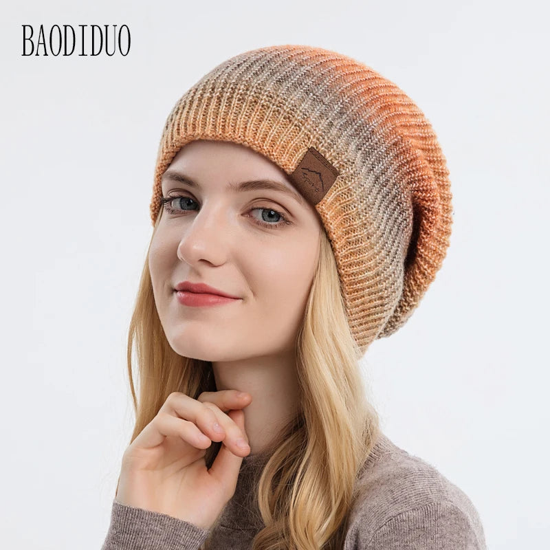 Xinbaoguan 60% acrylic 9858 autumn and winter new knitted hat trend gradient tie dye warm hat rainbow fashionable woolen hat