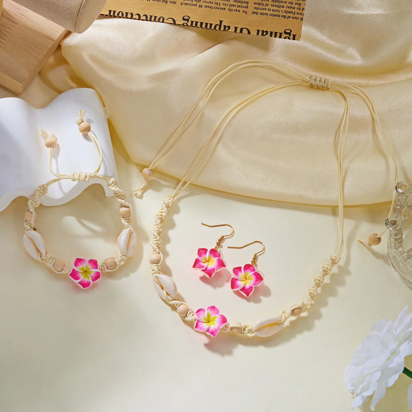 Boho Hawaiian Plumeria Flower Jewelry Set for Women Polymer Clay Cowrie Shell Choker Necklace Woven Bracelet Earrings Vacation