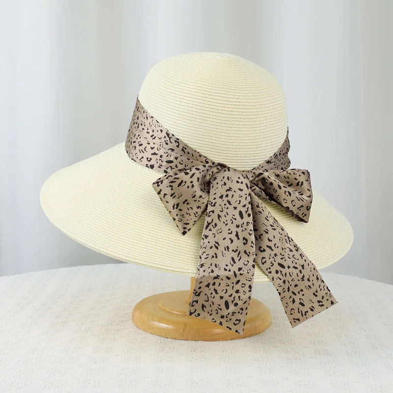 6177-New summer women's high-end leopard print bow hat for beach and resort, with sun protection function.