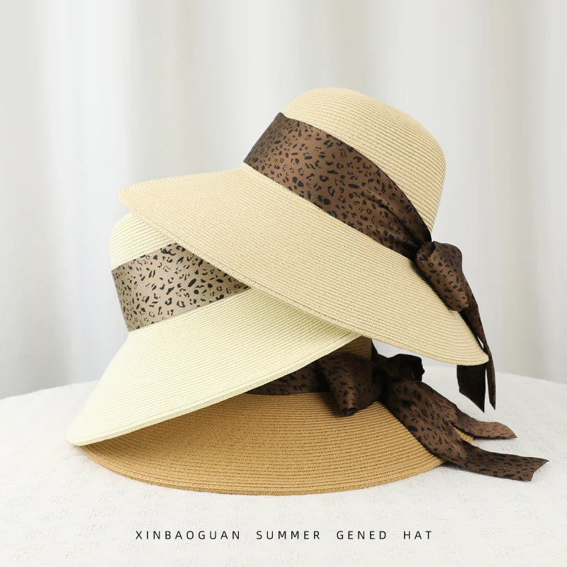 6177-New summer women's high-end leopard print bow hat for beach and resort, with sun protection function.