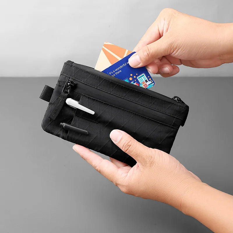 Zip Clutch with Wristband, Passport Holder Zipper Wallet and EDC Carrier - Weatherproof and RFID Blocking - 3 External Slots