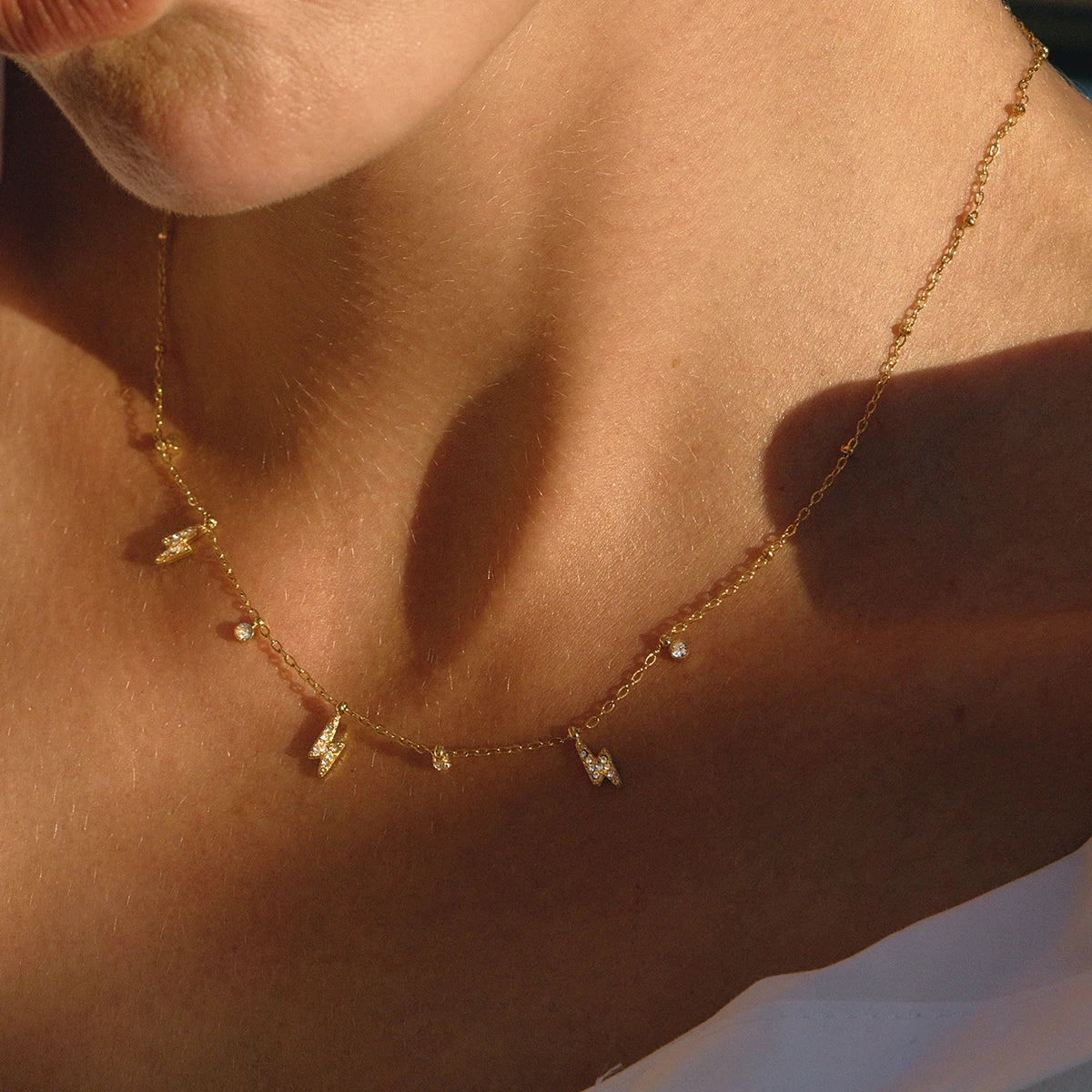 Uworld Simple Classic 18K Gold Color Plated Stainless Steel White Water Rhinestone Lightning Pendant Necklace Stackable Chain Ne