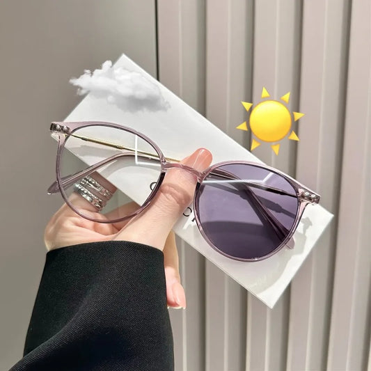 A Pair of Stylish Photochromic Glasses for Women Featuring A Vintage Semi Metal Frame Classic Minimalist Design