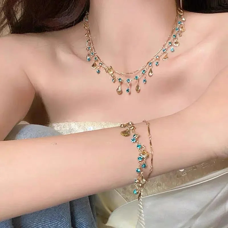 Dainty Gold Plated Scallop Shell Necklace Minimalist Layered Chain Blue Crystal Clavicle Necklace Trendy 2026 Summer Jewelry: