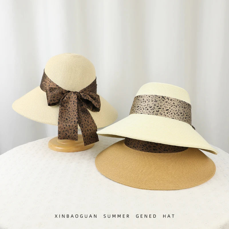 6177-New summer women's high-end leopard print bow hat for beach and resort, with sun protection function.