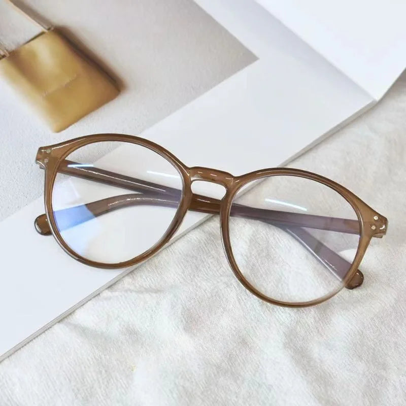 Men's and Women's Retro Rivet Lightweight Round Frame Anti Blue Light Glasses Suitable for Casual Wear