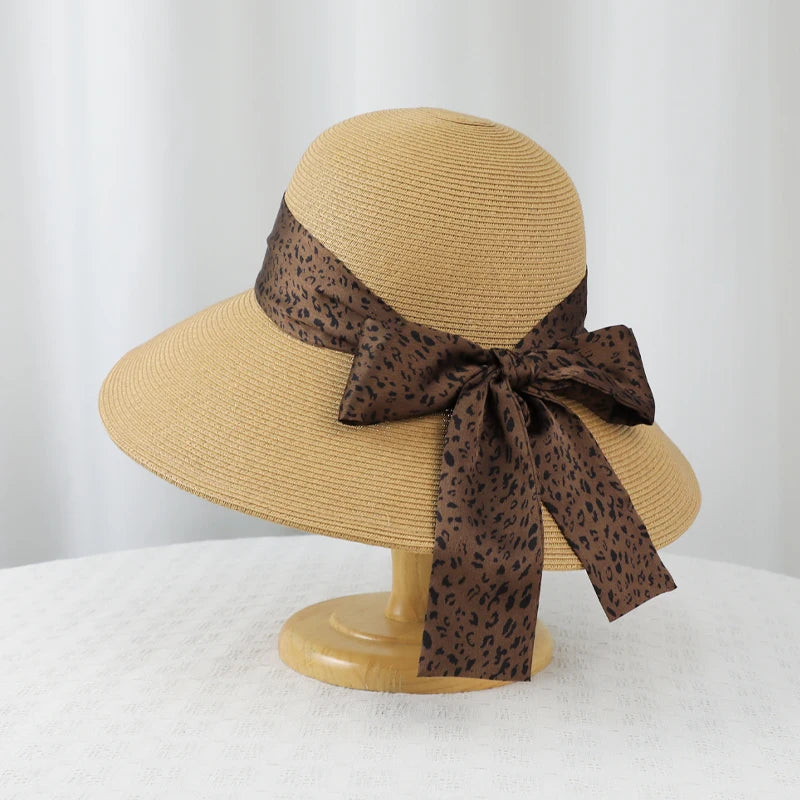 6177-New summer women's high-end leopard print bow hat for beach and resort, with sun protection function.