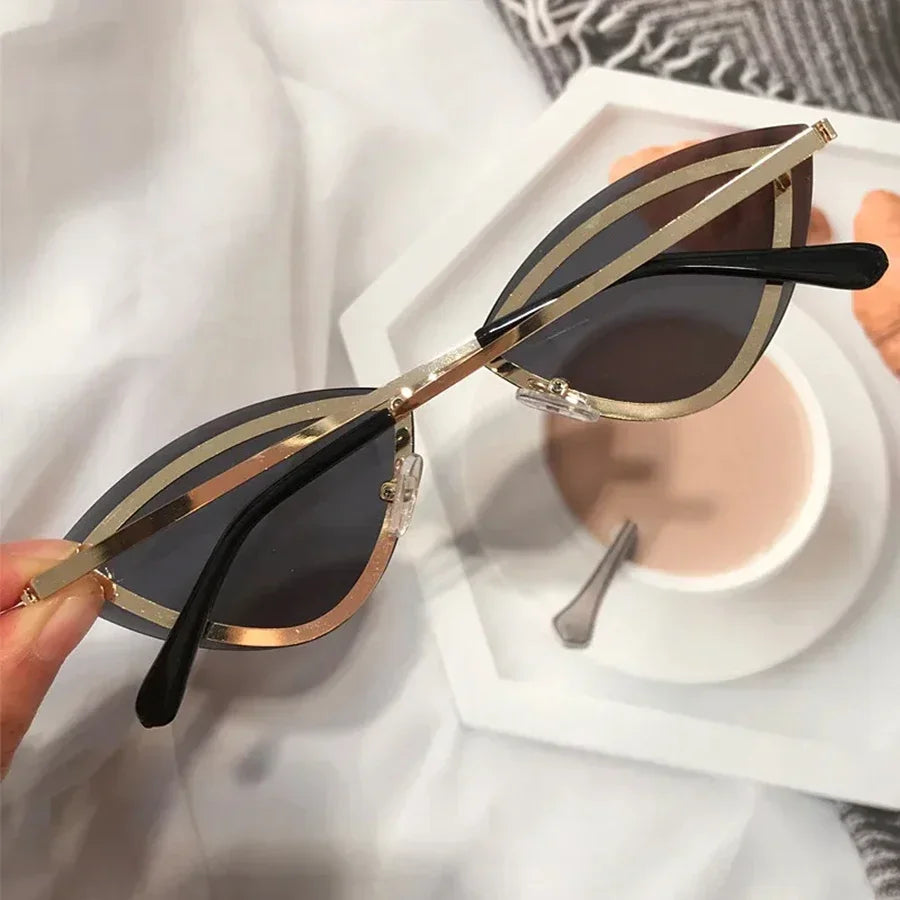 JNPCXI New Triangle Cat Eye Sunglasses Alloy Rimless Crystal Shiny Sun Glasses Female Unique Elegant Green Rhinestone Shades
