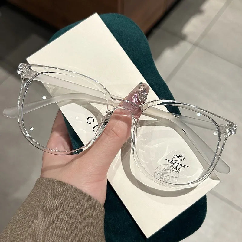 Photochromic Anti Radiation Glasses for Men and Women Simple Oval Anti-blue Transition Eyeglasses Outdoor Shade Sunglasses