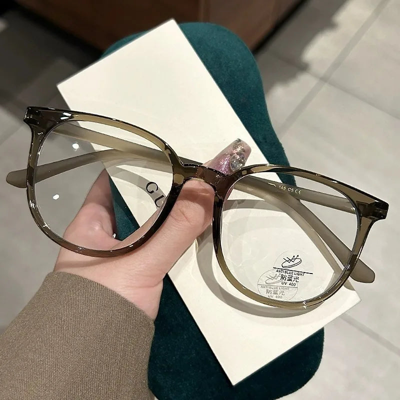 Photochromic Anti Radiation Glasses for Men and Women Simple Oval Anti-blue Transition Eyeglasses Outdoor Shade Sunglasses