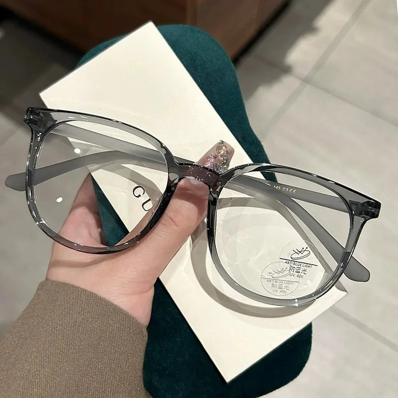 Photochromic Anti Radiation Glasses for Men and Women Simple Oval Anti-blue Transition Eyeglasses Outdoor Shade Sunglasses