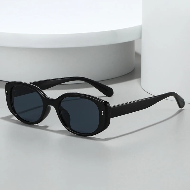 JNPCXI New Retro Small Oval Sunglasses Women Black Frame UV400 Protection Fashion Cat Eye Shades For Daily Travel