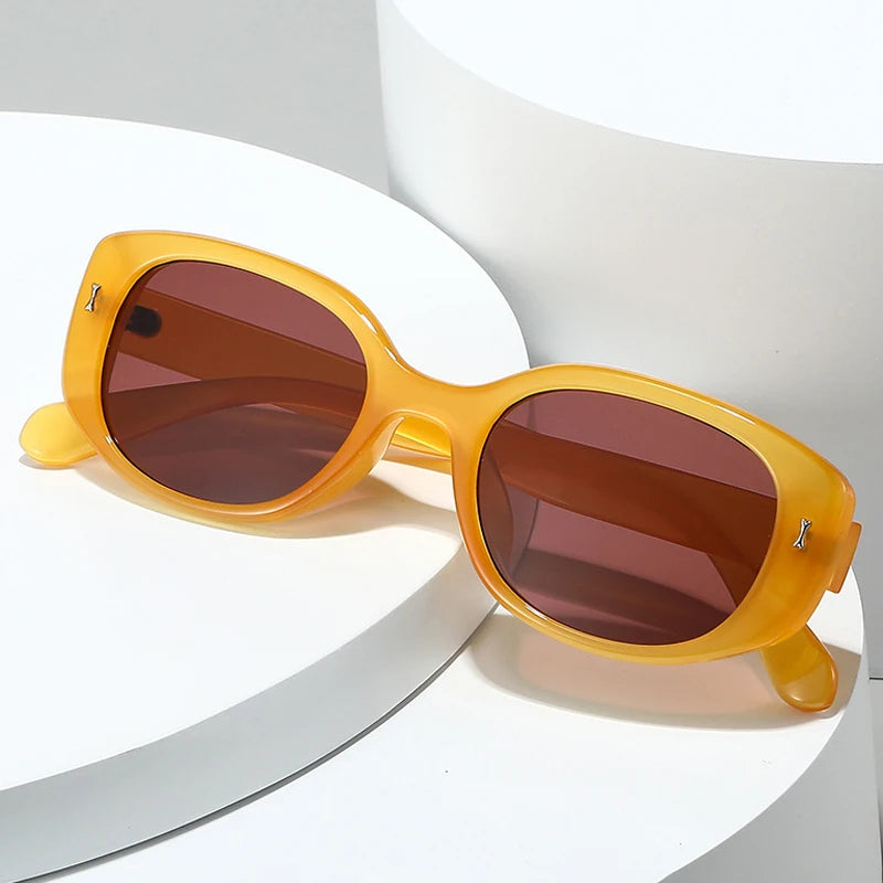 JNPCXI New Retro Small Oval Sunglasses Women Black Frame UV400 Protection Fashion Cat Eye Shades For Daily Travel