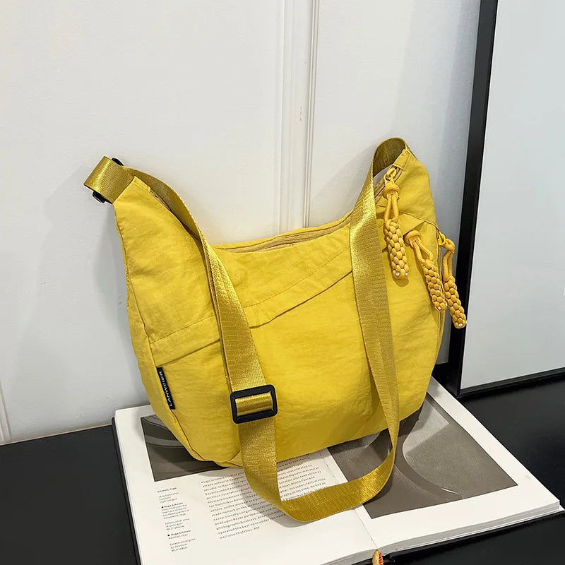 Casual Nylon Dumpling aped Crossbody Bag Women's Large Capaci oulder Bag 2026 Autumn Season Zipper Closure Faionable Handbags