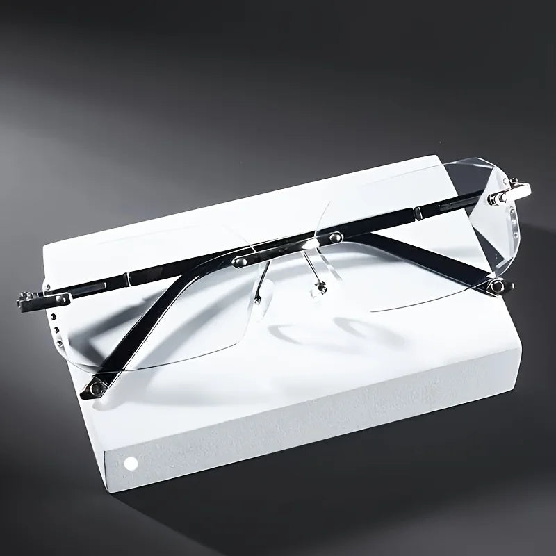 A stylish, unisex, frameless flat-lens sunglasses with transparent lenses, featuring a rectangular design for casual wear.