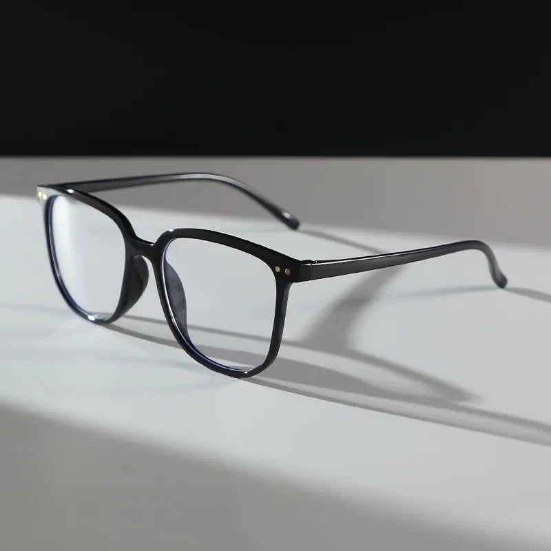 A Pair of Women'S Plastic Geometric Oversized Frames with a Minimalist And Casual Style, Featuring Plain Lenses.