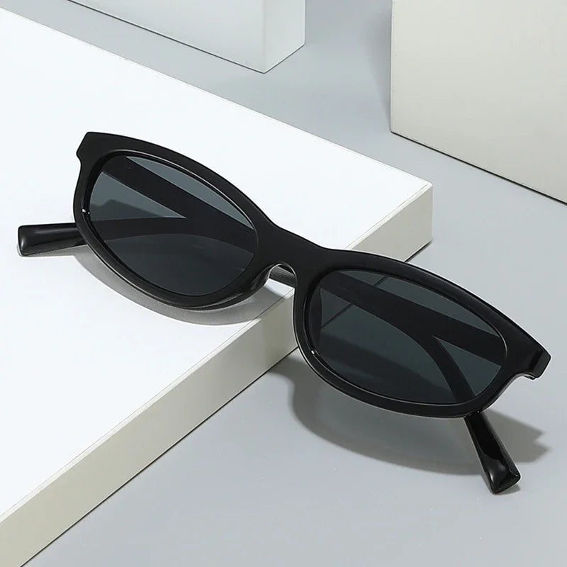 JNPCXI New Fashion Small Cat Eye Women Sunglasses Retro Leopard Tea Shades UV400 Men Trending Sun Glasses
