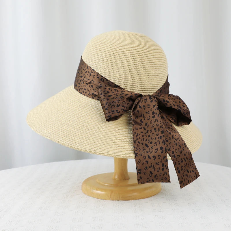 6177-New summer women's high-end leopard print bow hat for beach and resort, with sun protection function.
