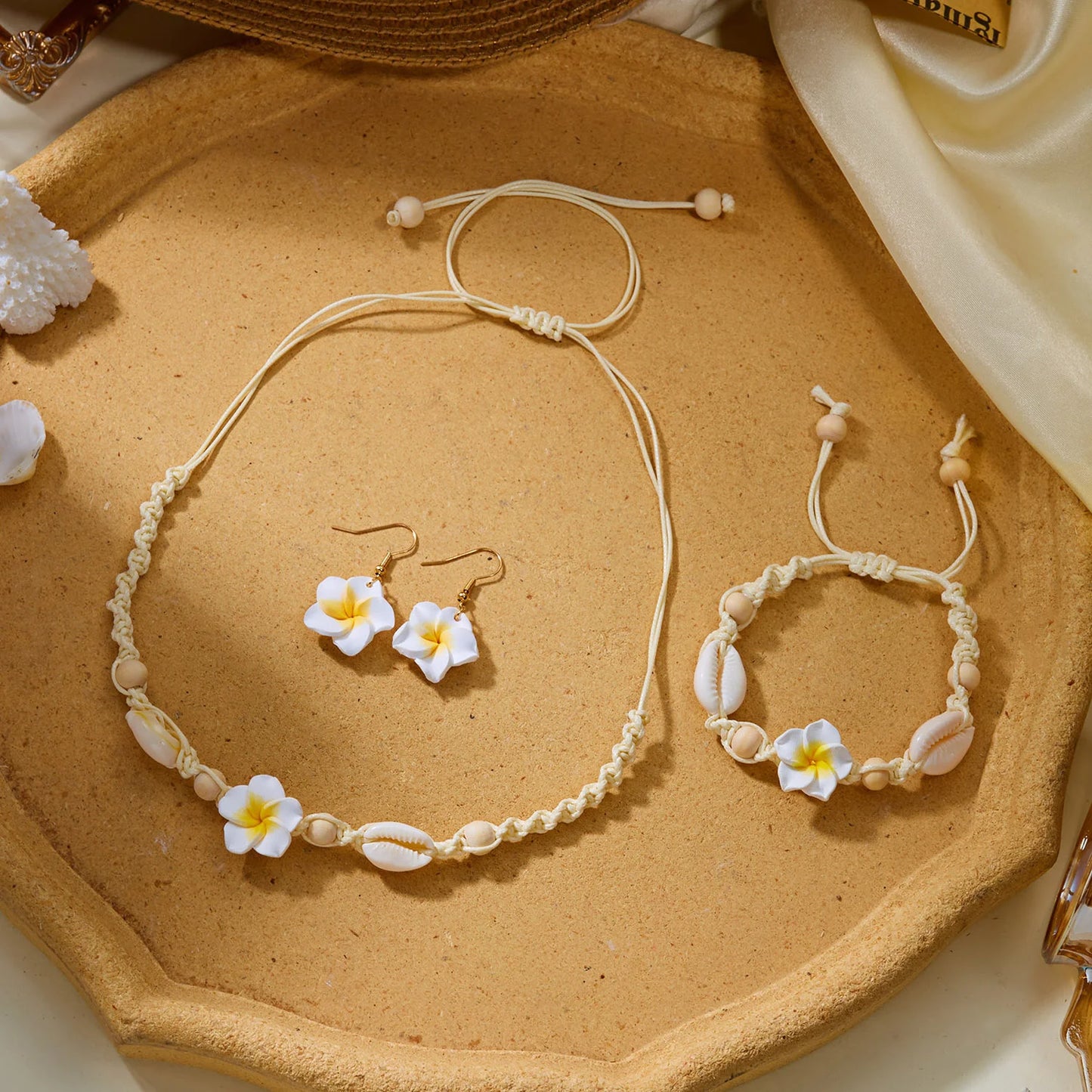 Boho Hawaiian Plumeria Flower Jewelry Set for Women Polymer Clay Cowrie Shell Choker Necklace Woven Bracelet Earrings Vacation