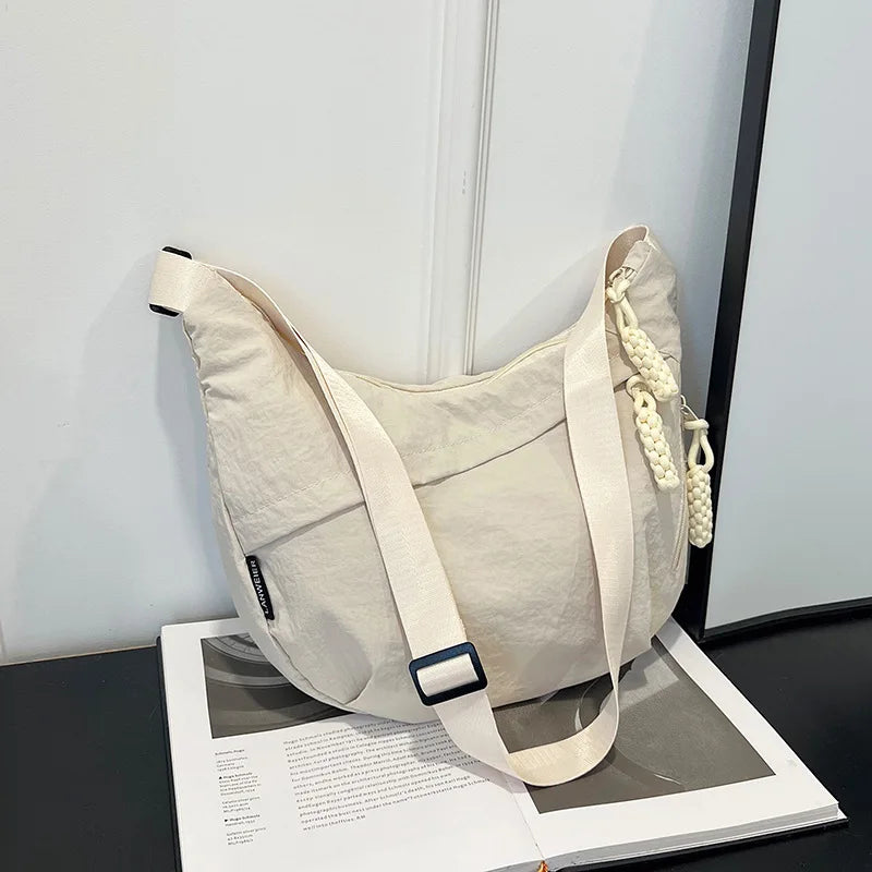 Casual Nylon Dumpling aped Crossbody Bag Women's Large Capaci oulder Bag 2026 Autumn Season Zipper Closure Faionable Handbags
