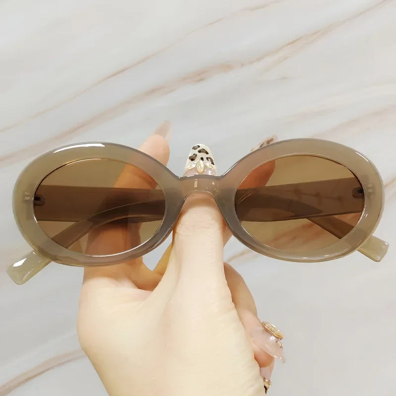 JNPCXI Oval Jelly Color Women Sunglasses Fashion Black Light Tea Shades UV400 Men Trending Gradient Sun Glasses
